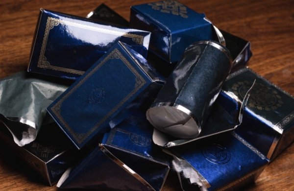 Luxury skincare or supplement packaging damaged during shipping (crushed corners, dents, broken closures)