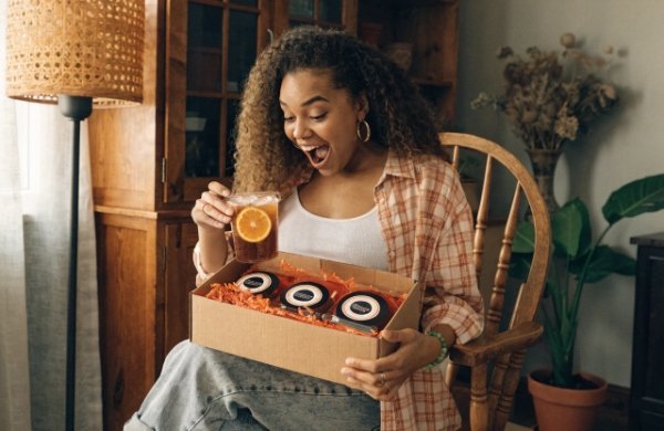Happy customer enjoying a perfect unboxing with packaging that matches the approved sample exactly