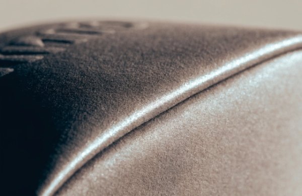 Close-up of luxurious soft-touch matte finish on supplement pouch