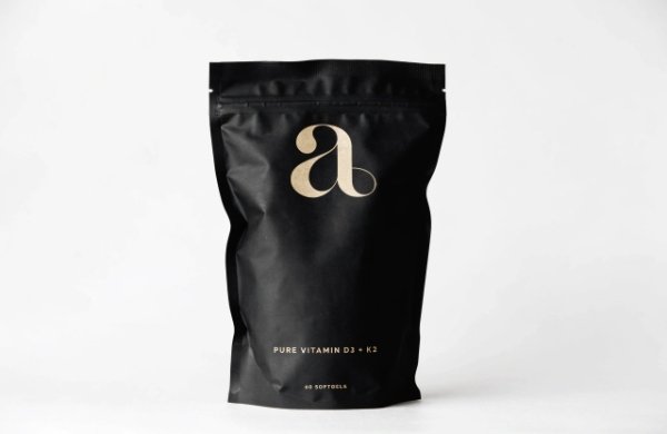 Minimalist elegant supplement pouch with clean design and white space
